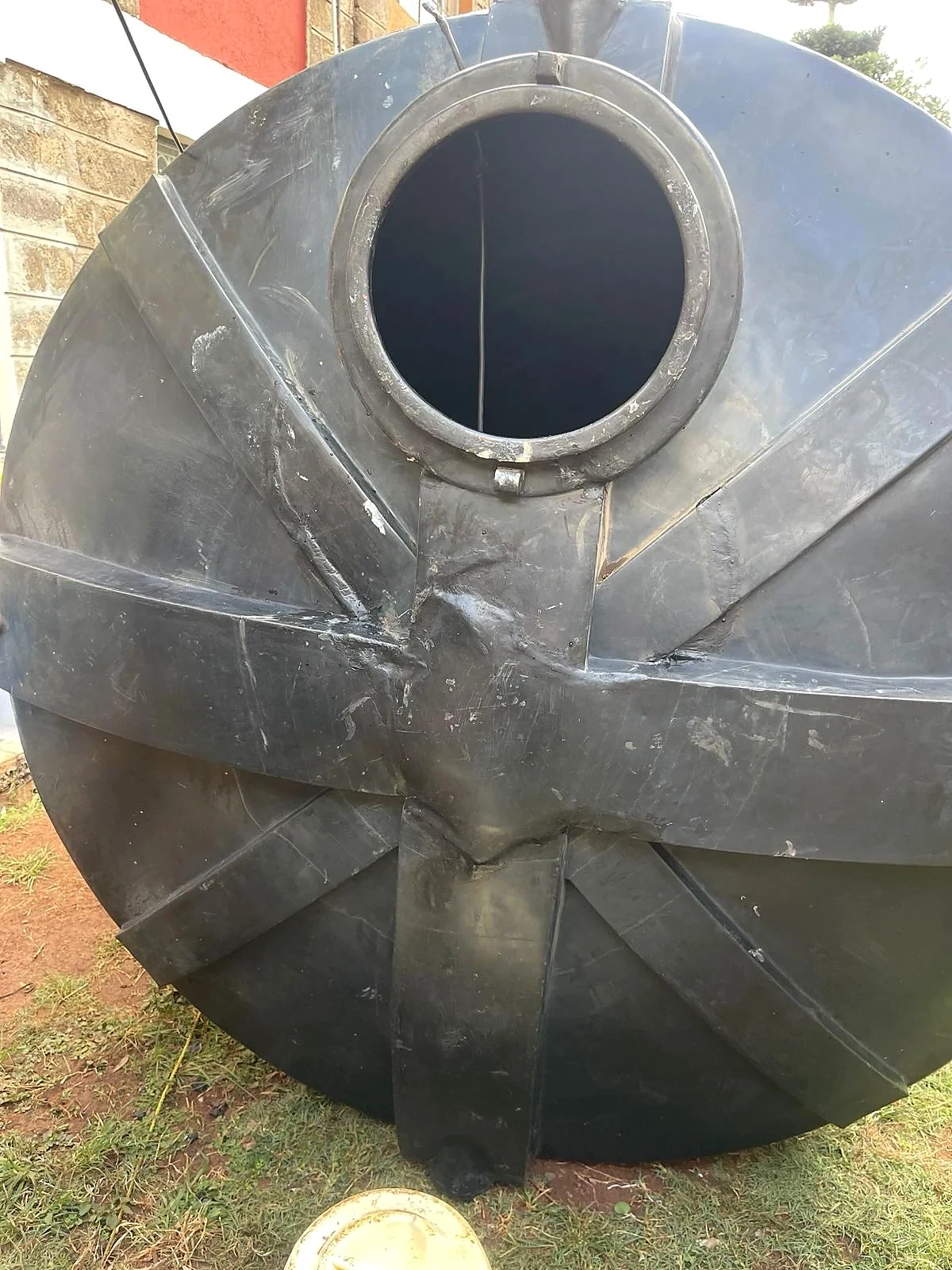 A collapsed tank top reconstructed â after repair
